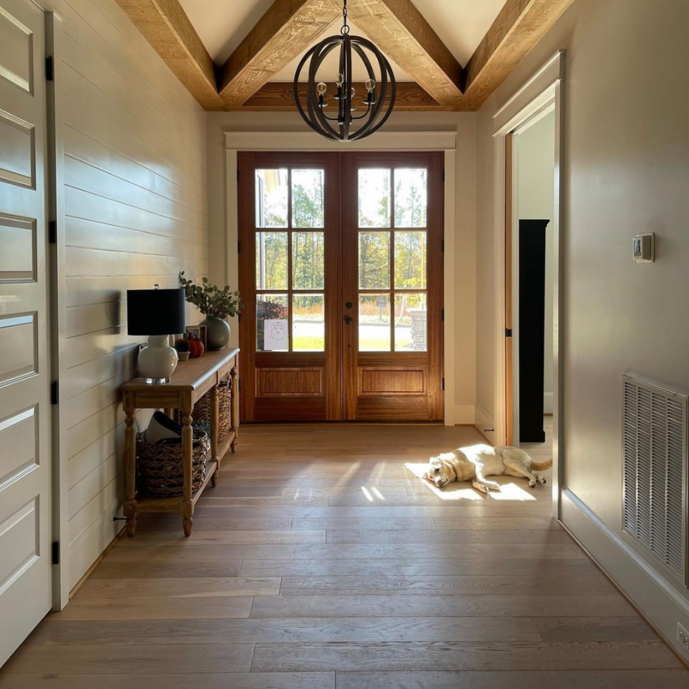 Design ideas for a medium sized modern front door in Los Angeles with white walls, light hardwood flooring, a double front door, a medium wood front door, multi-coloured floors, exposed beams and tongue and groove walls.