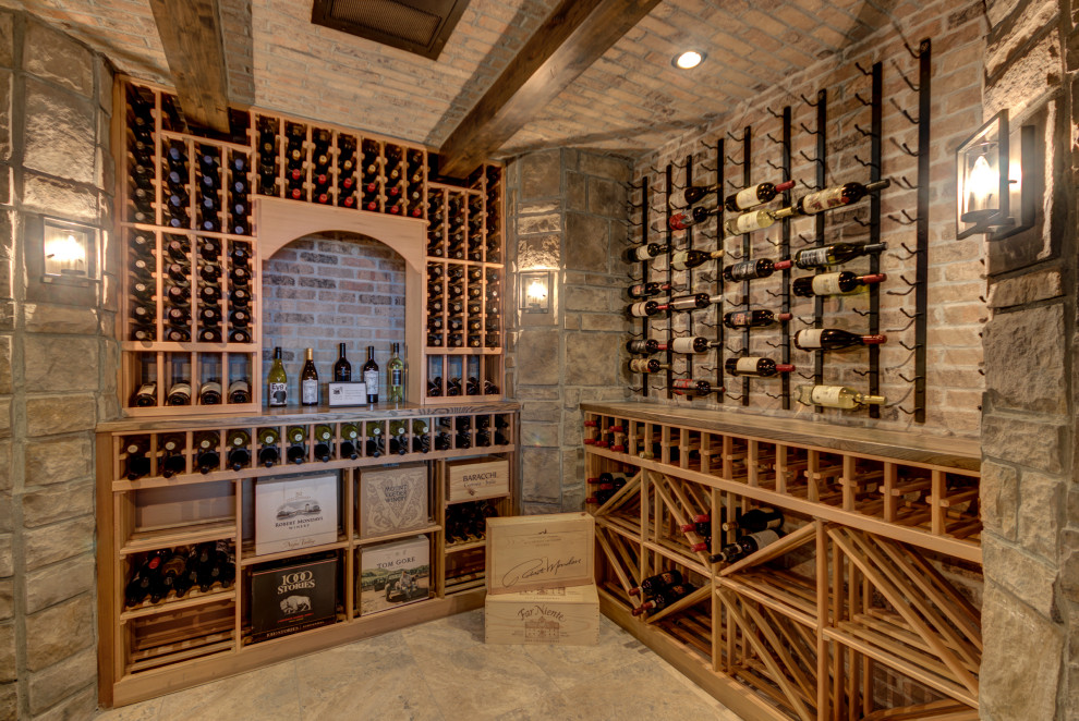 Photo of a large traditional wine cellar in Boston.