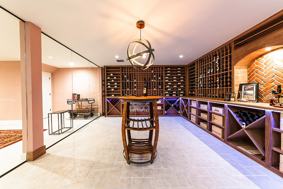 This is an example of a large transitional wine cellar in Philadelphia with porcelain floors, display racks and beige floor.