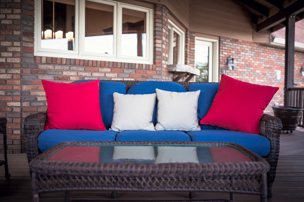 Outdoor kitchen deck - huge rustic backyard outdoor kitchen deck idea in Indianapolis with a roof extension