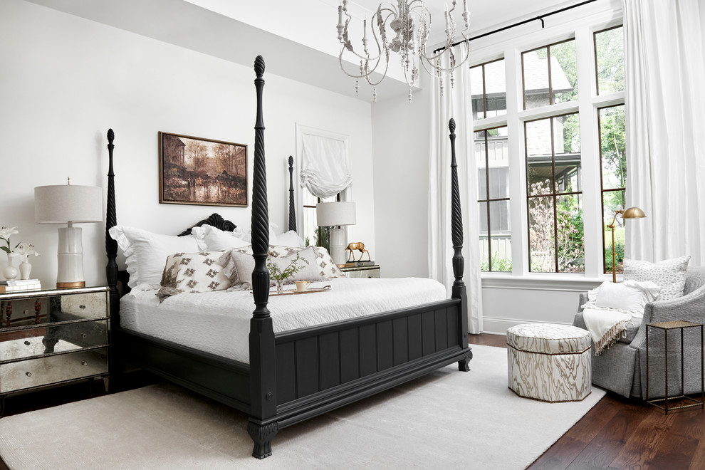 Inspiration for a beach style master bedroom in Nashville with white walls, dark hardwood floors and no fireplace.