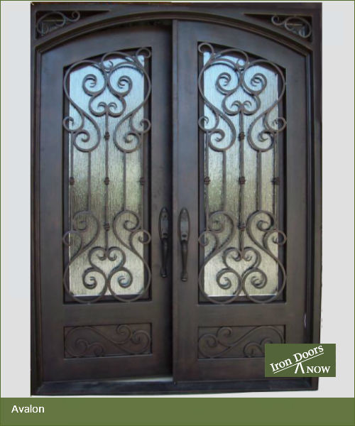 Photo of a mid-sized mediterranean front door in Los Angeles with a double front door.