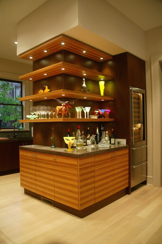 Eat-in kitchen - mid-sized contemporary u-shaped light wood floor eat-in kitchen idea in Charlotte with an undermount sink, flat-panel cabinets, medium tone wood cabinets, stainless steel appliances and an island