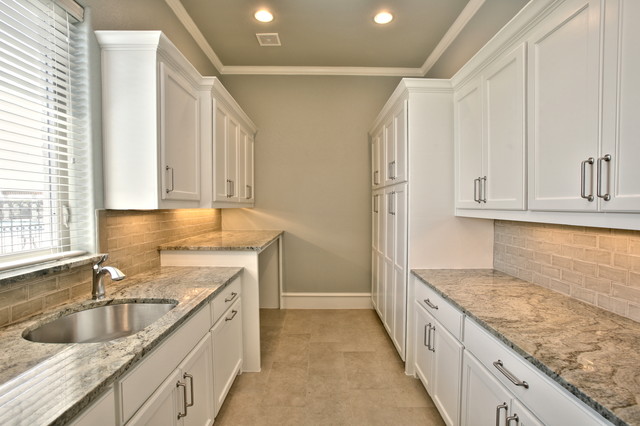 Painted Brick Villa transitional-laundry-room
