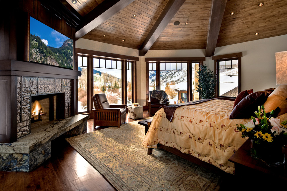 Inspiration for a traditional bedroom in Salt Lake City with a corner fireplace.
