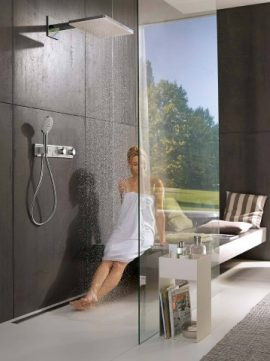 woman sitting in spa shower