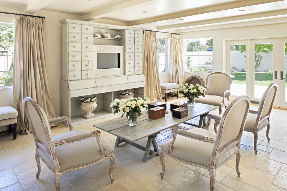 Inspiration for a country living room in Phoenix with beige walls and a built-in media wall.