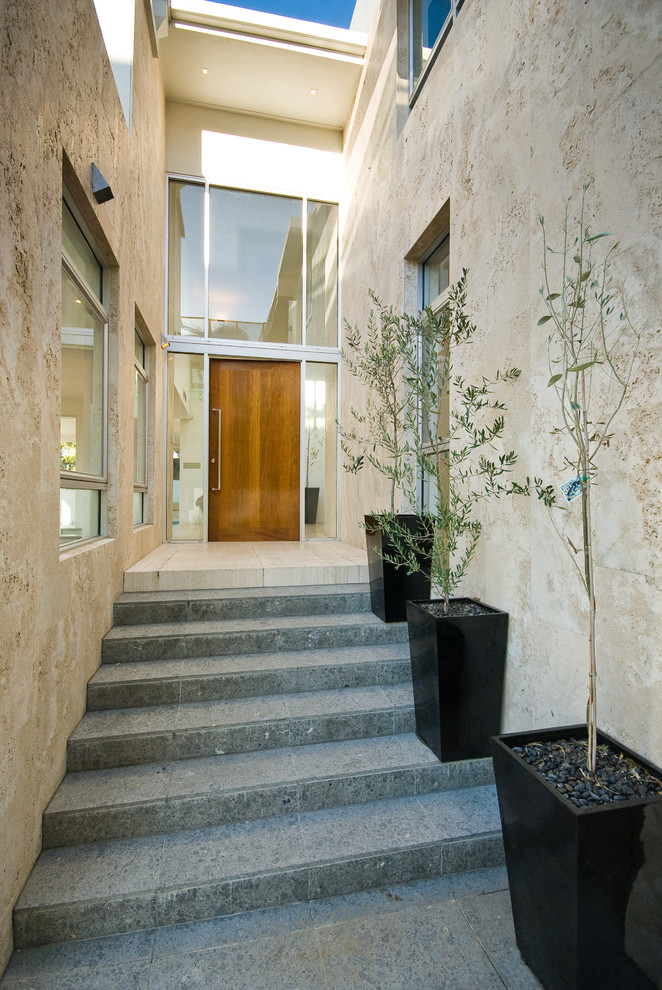 Photo of a contemporary home design in Brisbane.