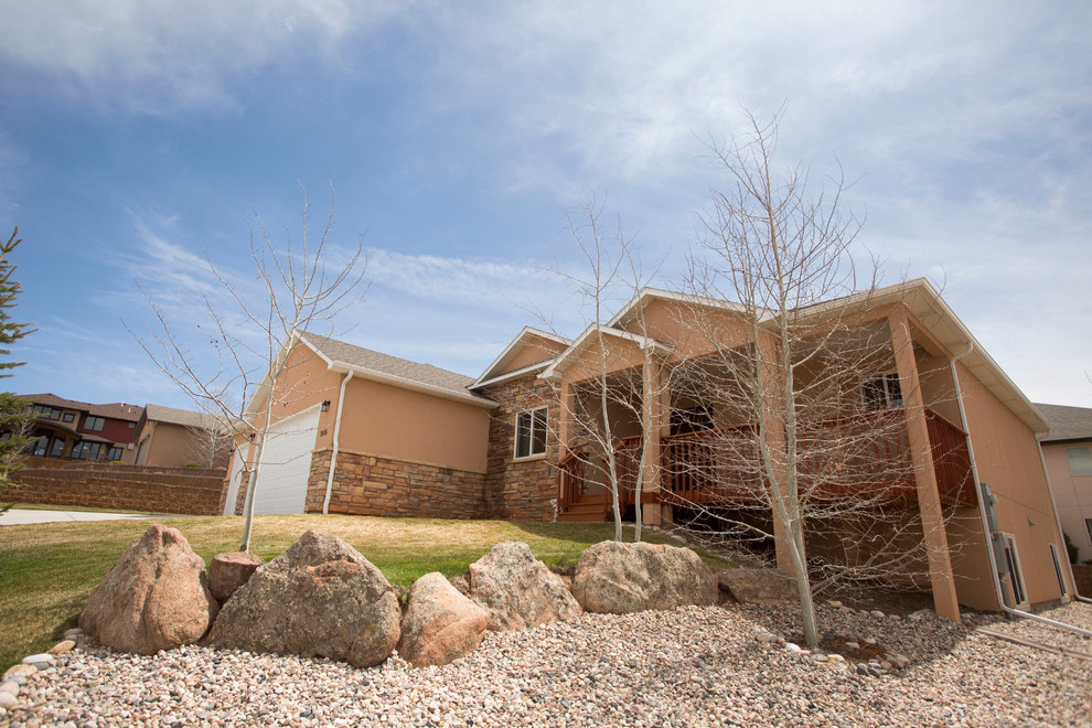 Design ideas for a large transitional partial sun landscaping for spring.