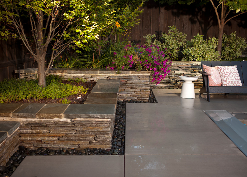 This is an example of a contemporary backyard patio in Salt Lake City.