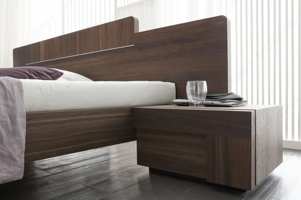 This is an example of a mid-sized contemporary master bedroom in New York.