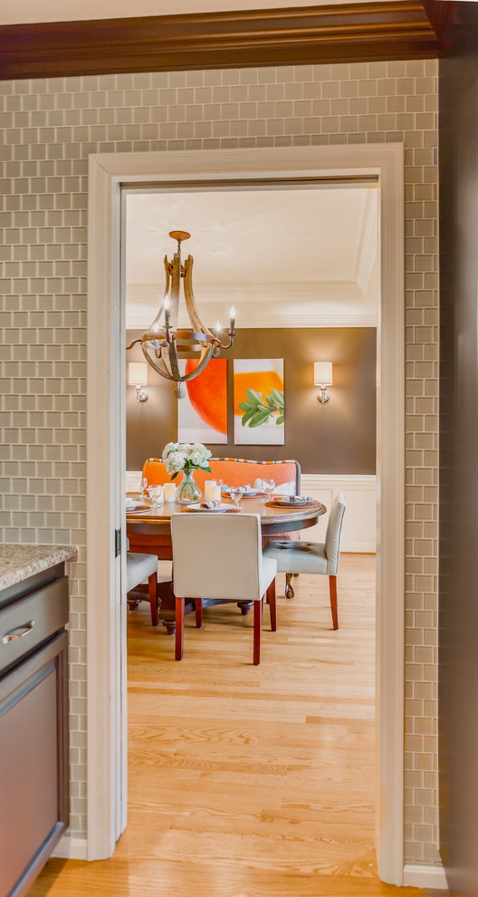 Example of a transitional dining room design in Seattle