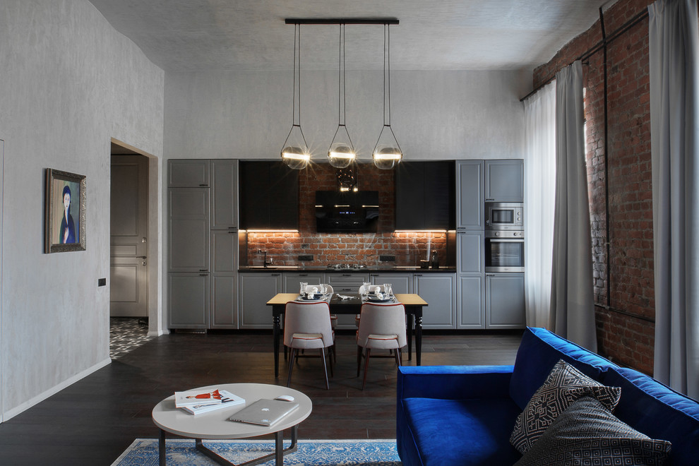 Inspiration for an industrial kitchen in Saint Petersburg with grey cabinets.