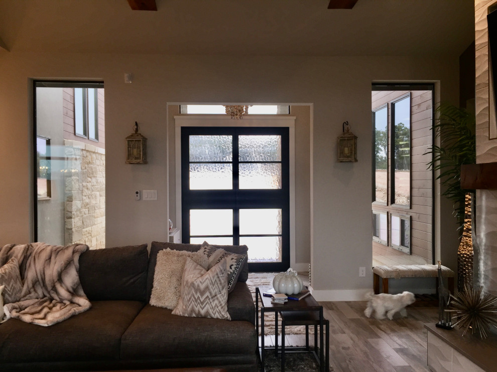Example of a small transitional double front door design with a black front door