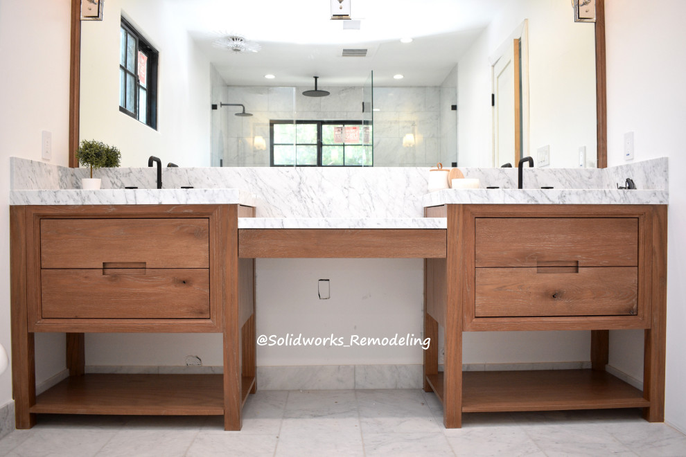 Inspiration for a large midcentury master bathroom in Los Angeles with a freestanding tub, an open shower, a one-piece toilet, white walls, marble floors, a drop-in sink, marble benchtops, a shower seat, a double vanity and a freestanding vanity.