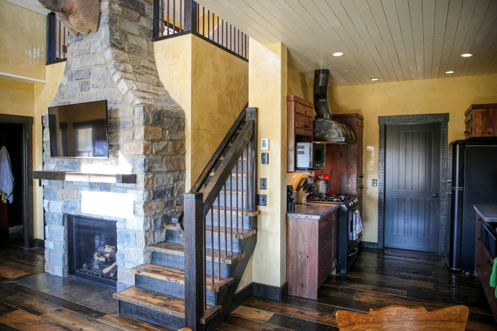 Mountain style home design photo in Calgary