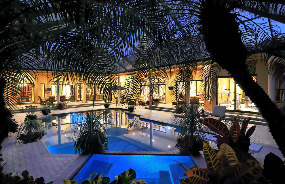 Design ideas for a tropical indoor pool in Tampa.