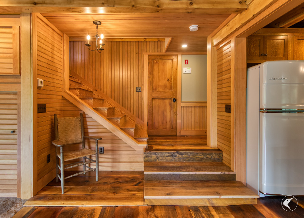Staircase - rustic wood wall staircase idea