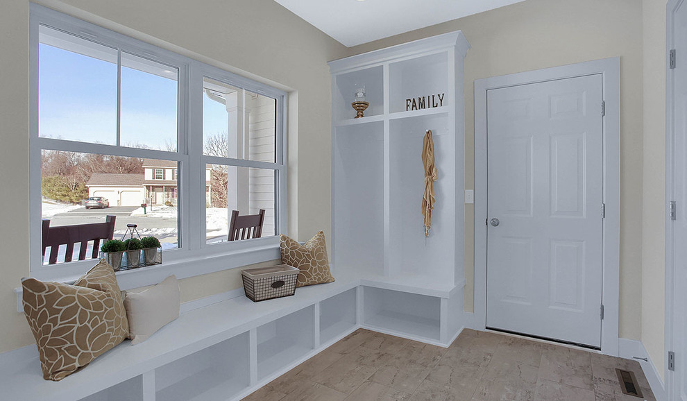 This is an example of a large traditional mudroom in Other with grey walls, vinyl floors, a single front door and a white front door.