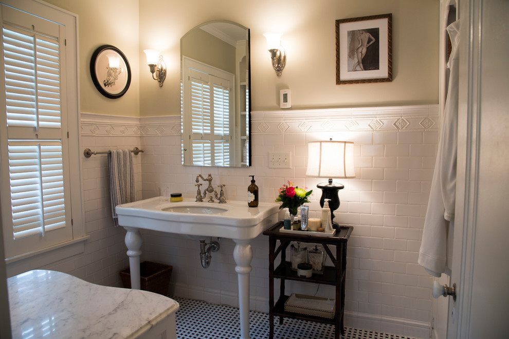 Small traditional master bathroom in Milwaukee with a console sink, flat-panel cabinets, white cabinets, marble benchtops, a double shower, a one-piece toilet, black and white tile, porcelain tile, grey walls and mosaic tile floors.