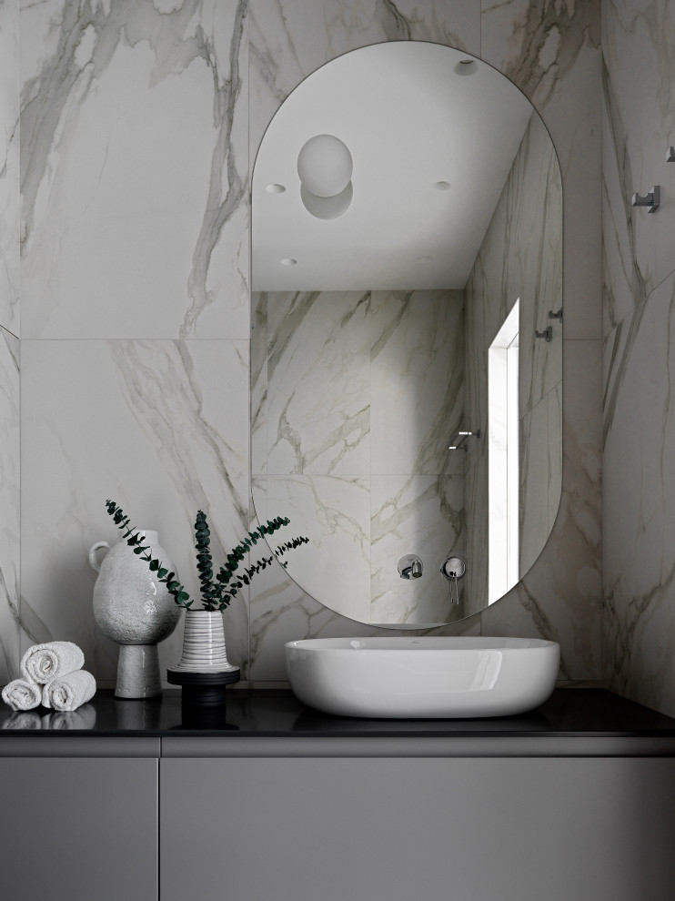 Inspiration for a mid-sized contemporary master bathroom in Moscow with flat-panel cabinets, grey cabinets, an alcove tub, a wall-mount toilet, white tile, porcelain tile, grey walls, porcelain floors, a drop-in sink, solid surface benchtops, white floor, an open shower, grey benchtops, an enclosed toilet, a single vanity and a floating vanity.