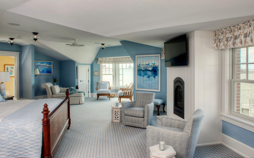 Inspiration for a traditional bedroom in Philadelphia with blue walls, carpet, a standard fireplace and blue floor.