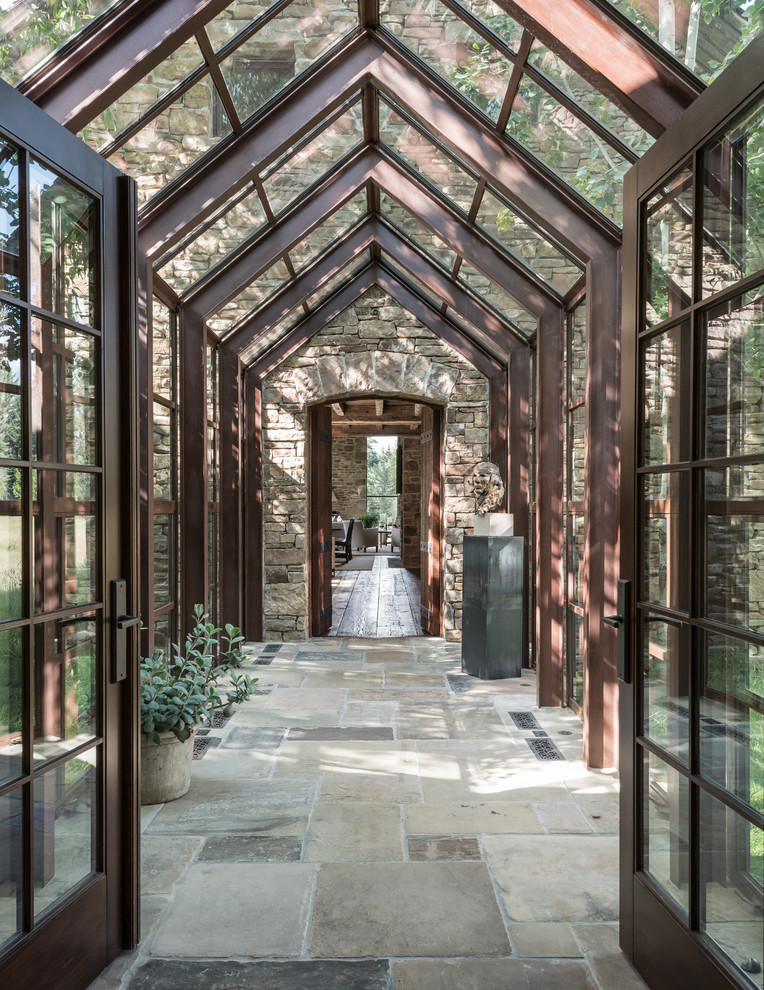 Design ideas for a country sunroom in Other with a glass ceiling.