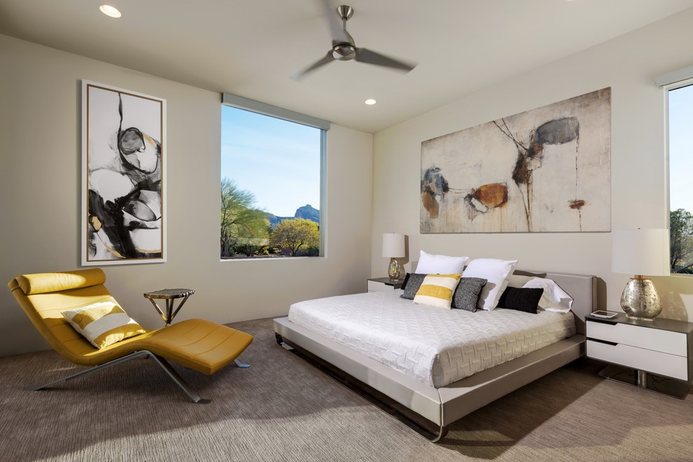 Large contemporary guest bedroom in Phoenix with white walls, porcelain floors and no fireplace.