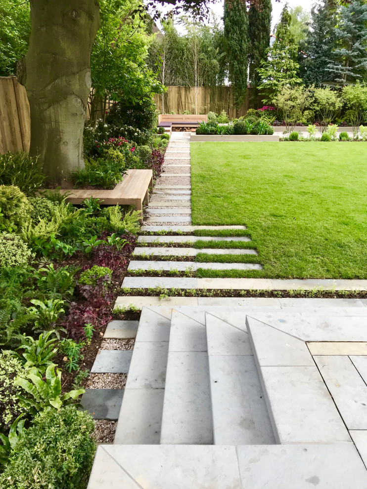 Inspiration for a large contemporary backyard formal garden in London.