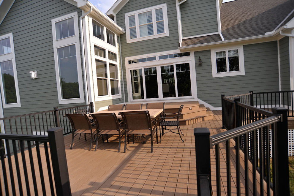 Design ideas for a traditional backyard patio in Columbus with decking and no cover.