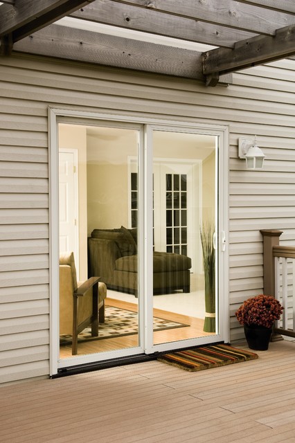 Modern Patio Cedar Rapids Pella Impervia ENERGYSTAR-qualified fiberglass sliding patio doors contemporary-patio