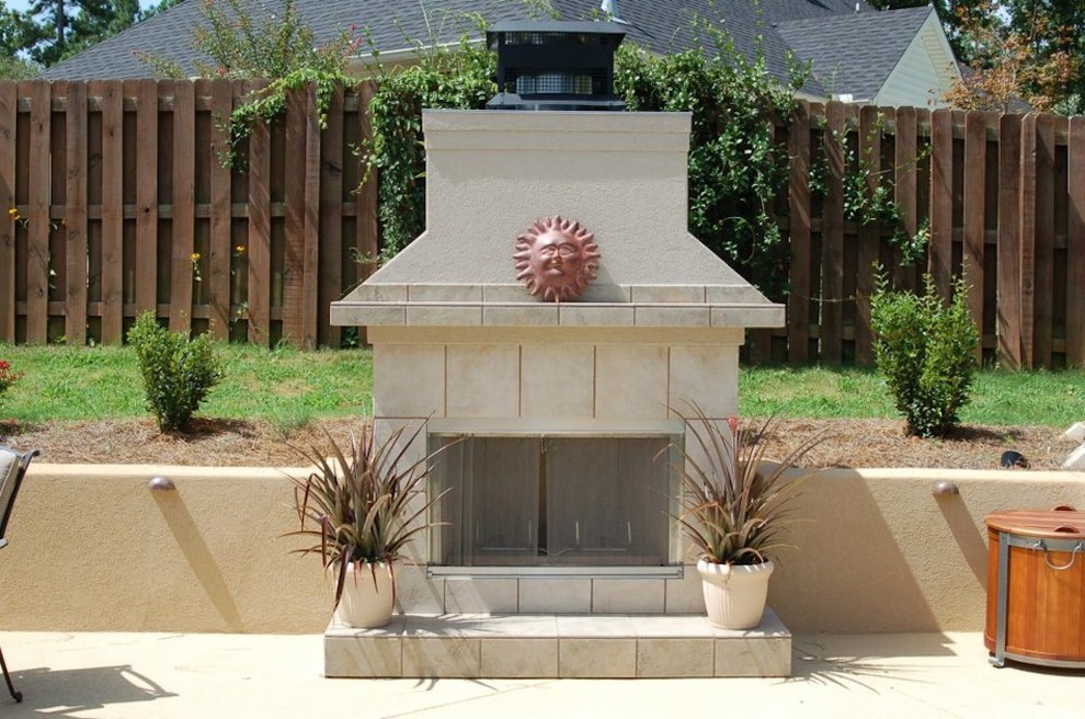 Inspiration for a mid-sized backyard concrete paver patio remodel in Atlanta with a fire pit and no cover