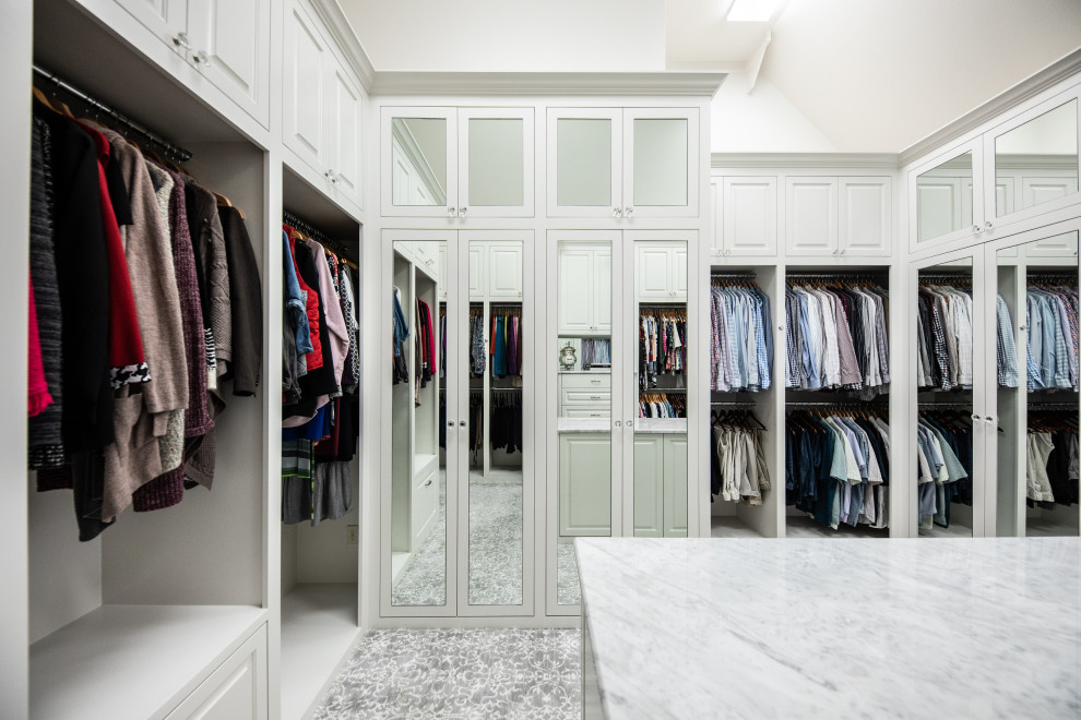 Photo of a large traditional gender-neutral walk-in wardrobe in Dallas with beaded inset cabinets, white cabinets, carpet, grey floor and vaulted.