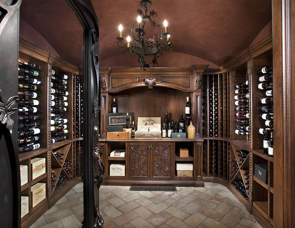 This is an example of a country wine cellar in Phoenix with storage racks and multi-coloured floor.