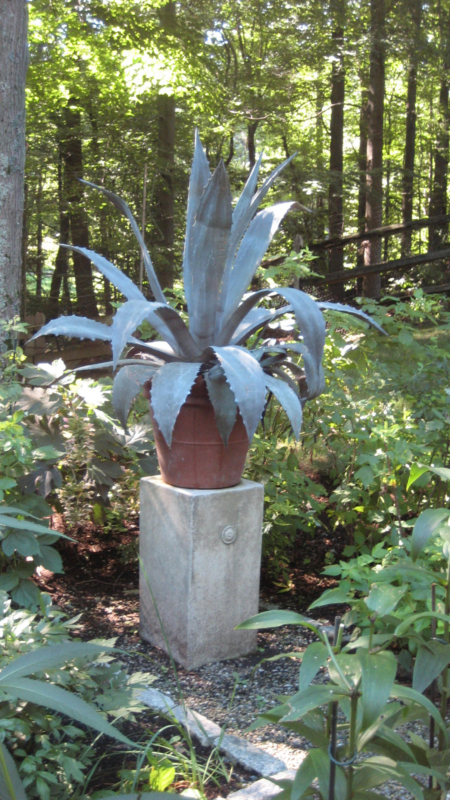 The sculpture of plants are not always in bright colors but still make a solid statement