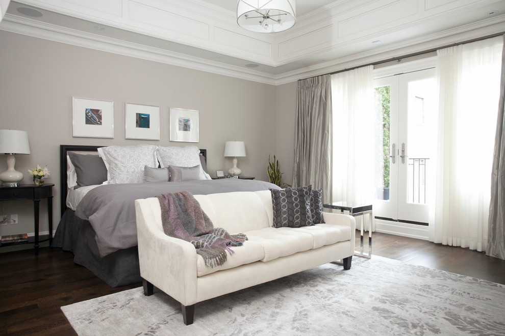 This is an example of a contemporary bedroom in Toronto with grey walls, dark hardwood floors and no fireplace.