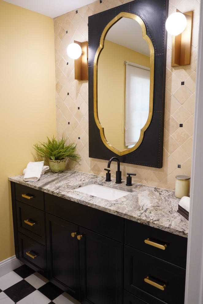 Mid-sized transitional 3/4 bathroom in New York with flat-panel cabinets, black cabinets, a one-piece toilet, yellow tile, travertine, yellow walls, porcelain floors, an undermount sink, granite benchtops, black floor and grey benchtops.