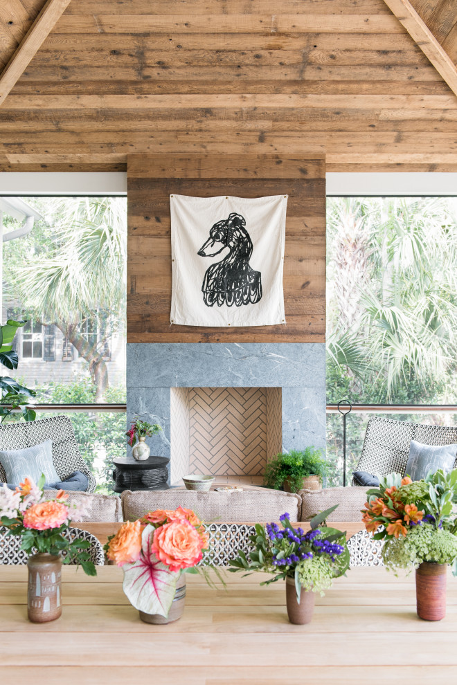 Sullivan's Island Remodel - Backyard screened porch feauting Ipe decking, mushroom board vaulted wood ceiling, soapstone fireplace surround and plenty of comfy seating.