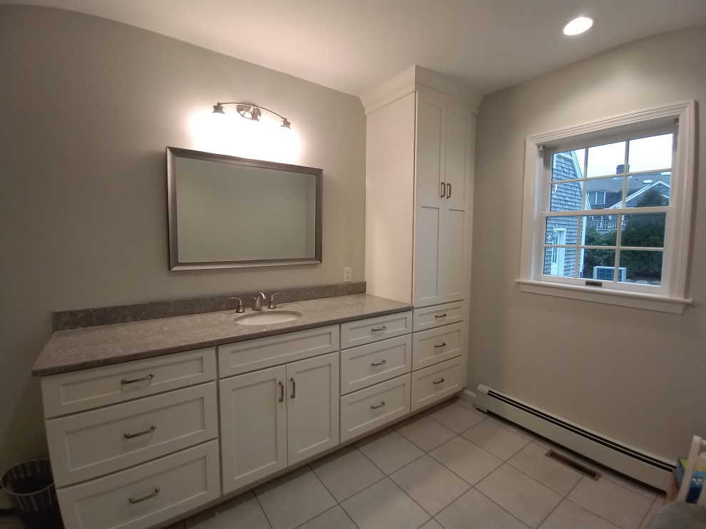 Masterbathroom vanity and new heater and tile,lights, etc.,