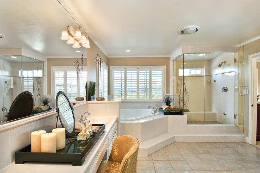 Large traditional master bathroom in Los Angeles with shaker cabinets, dark wood cabinets, a hot tub, a double shower, white tile, stone tile, brown walls, ceramic floors, a drop-in sink and tile benchtops.