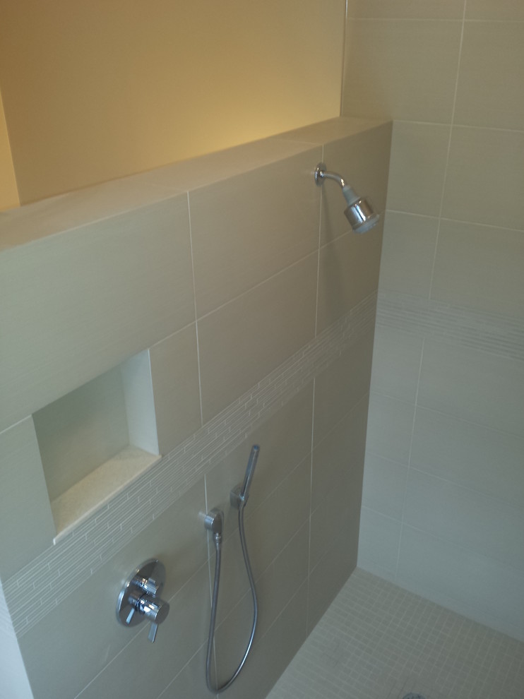 Medium sized contemporary ensuite bathroom in Chicago with flat-panel cabinets, dark wood cabinets, a walk-in shower, a two-piece toilet, beige tiles, ceramic tiles, beige walls and ceramic flooring.