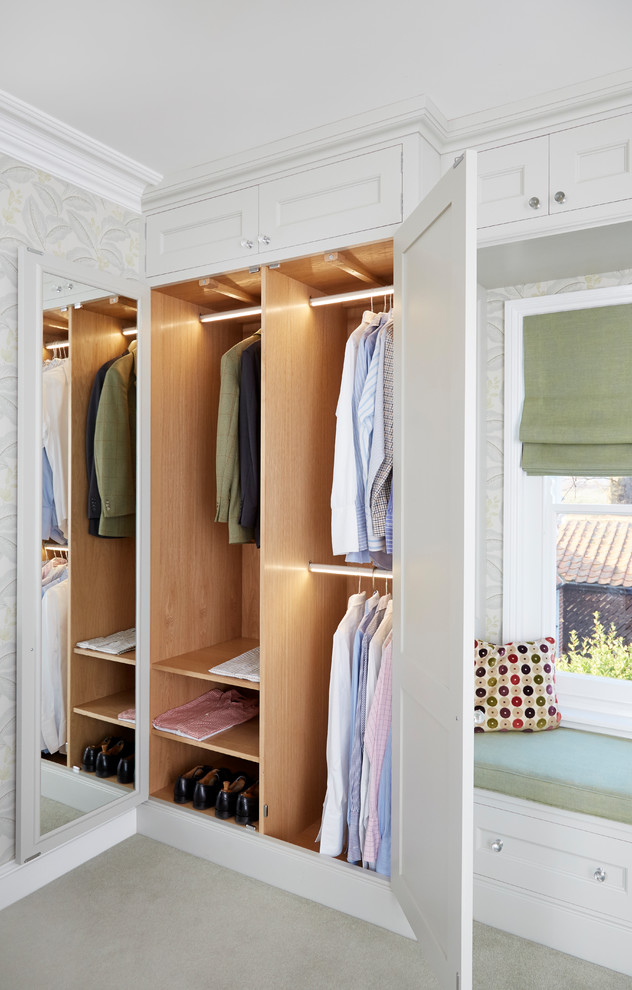 Traditional storage and wardrobe in Other with recessed-panel cabinets, white cabinets, carpet and grey floor.