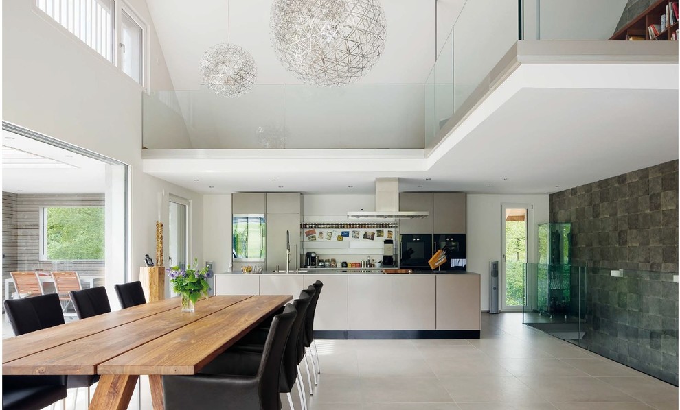 This is an example of a large contemporary open plan dining in Frankfurt.