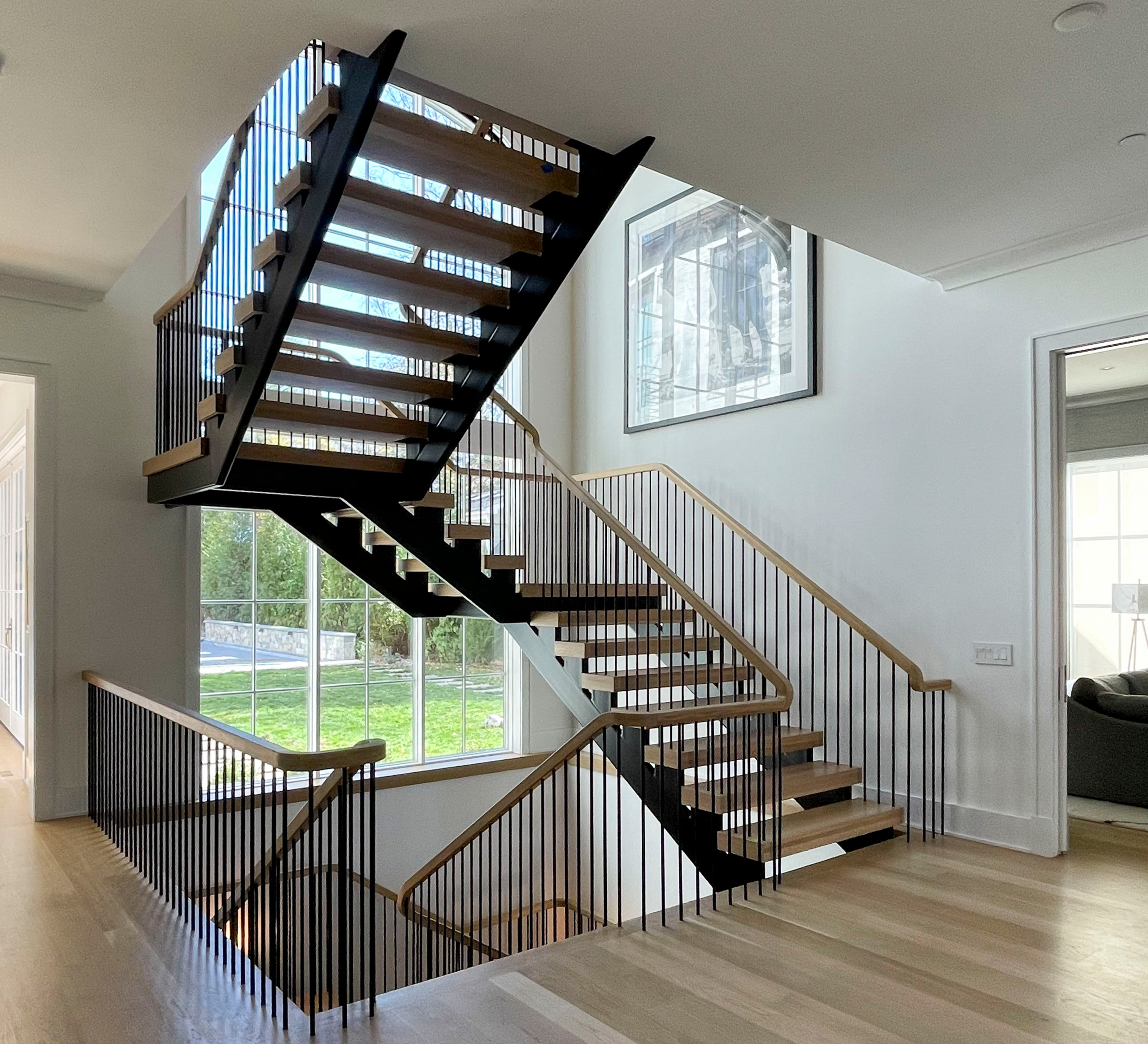 96_Dramatic cantilevered no-riser staircase, Bethesda, MD 20814