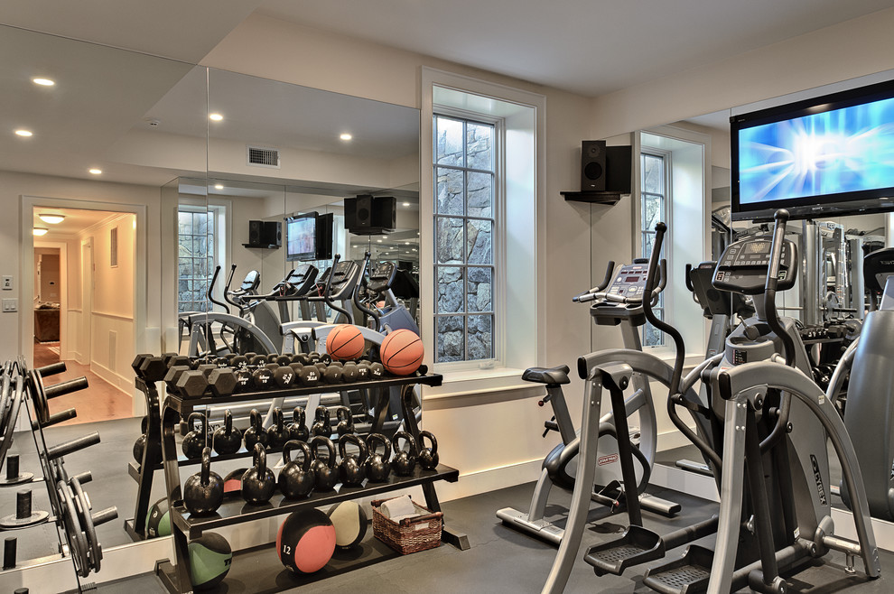 Design ideas for a traditional home gym in New York with grey floor.