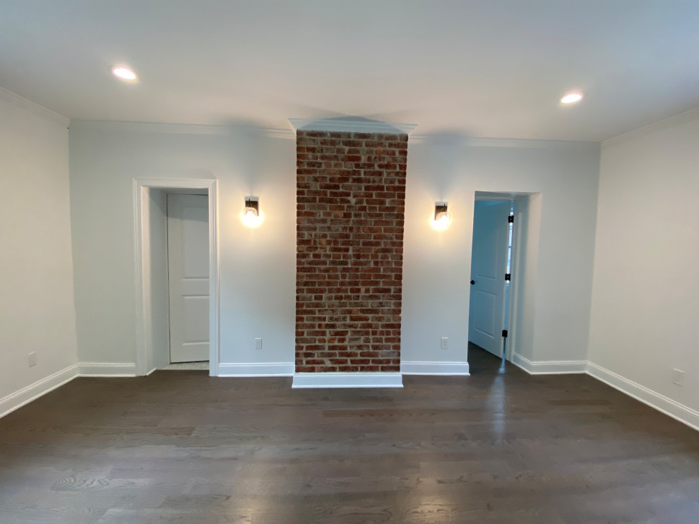 Exposed Brick Chimney with Wall Sconces