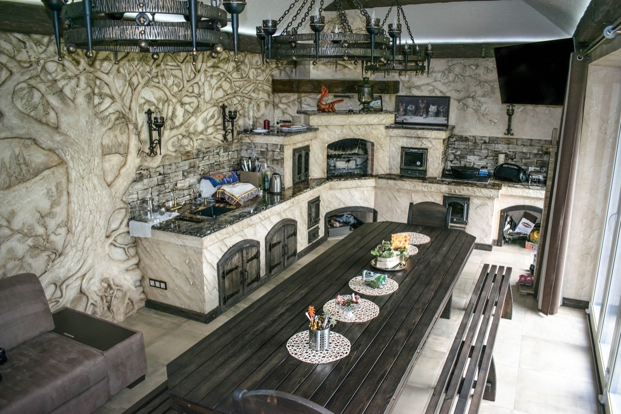 Крытая терраса с мангальной зоной в скандинавском стиле.