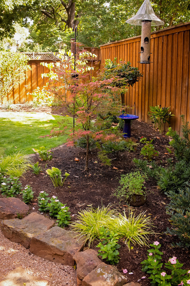 Design ideas for a traditional shade backyard stone and wood fence garden path in Dallas.