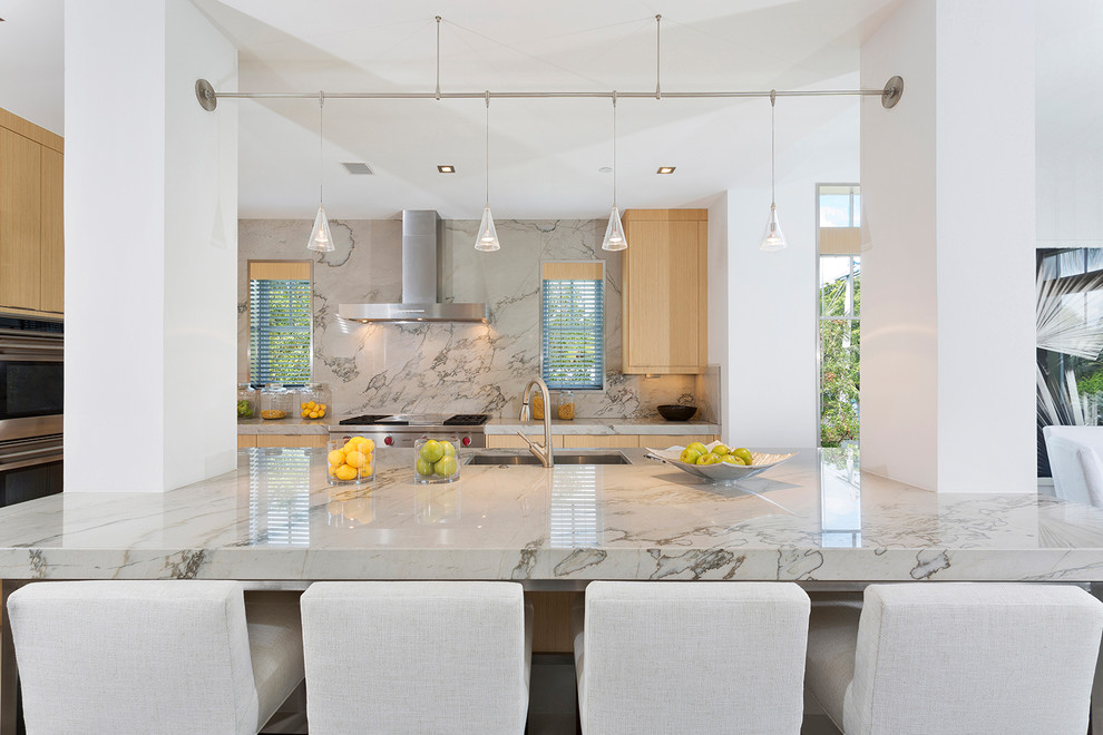 This is an example of a beach style kitchen in Miami.