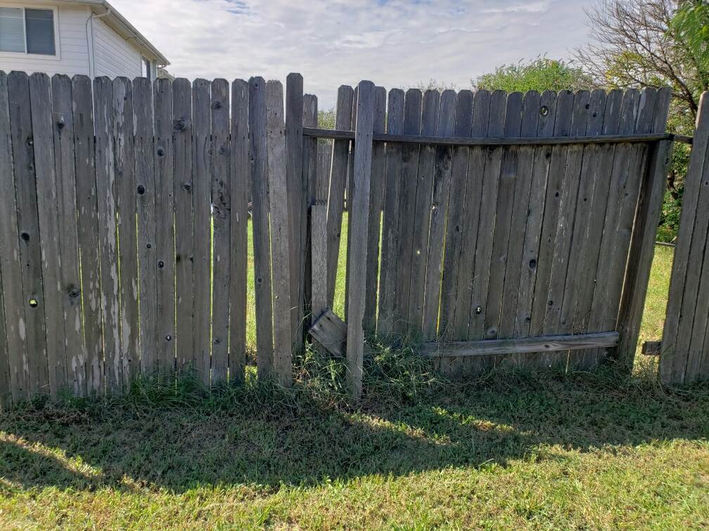 260' Wooden Fence Repaired/Reinforced